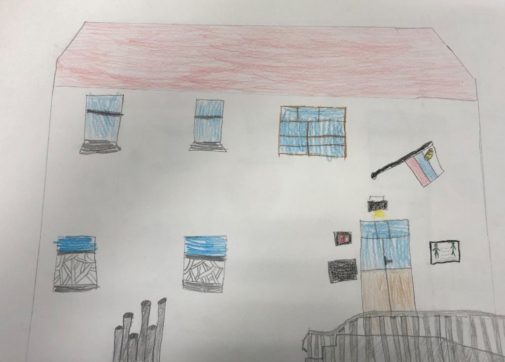 Na sliki je Podružnična šola Ledine, ki jo je narisala učenka Natalija Kosmač. 